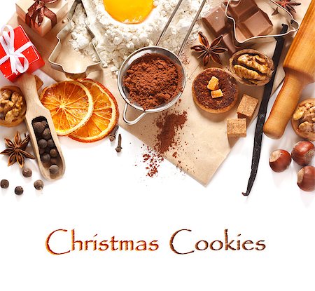 simsearch:400-05721521,k - Baking background with cookie ingredients, spices and cookie cutters on a white. Stock Photo - Budget Royalty-Free & Subscription, Code: 400-07175464