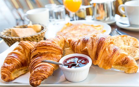 simsearch:400-05704519,k - Breakfast with coffee and croissants on table Stock Photo - Budget Royalty-Free & Subscription, Code: 400-07176354