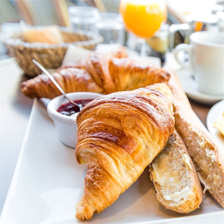 simsearch:400-05704519,k - Breakfast with coffee and croissants on table Stock Photo - Budget Royalty-Free & Subscription, Code: 400-07176355