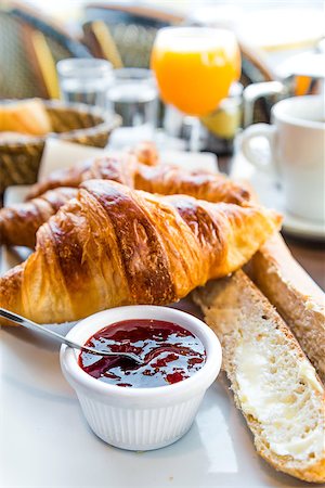 simsearch:400-05704519,k - Breakfast with coffee and croissants on table Stock Photo - Budget Royalty-Free & Subscription, Code: 400-07176356