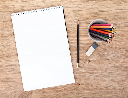 pencil crayon - Blank paper and colorful pencils on the wooden table. View from above Foto de stock - Super Valor sin royalties y Suscripción, Código: 400-07179659