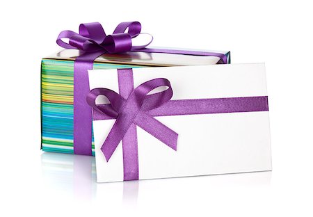 simsearch:400-08806797,k - Gift box and letter with ribbon and bow. Isolated on white background Photographie de stock - Aubaine LD & Abonnement, Code: 400-07179697