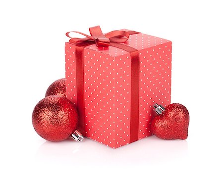 simsearch:400-08806797,k - Gift box with ribbon and bow and christmas decor. Isolated on white background Photographie de stock - Aubaine LD & Abonnement, Code: 400-07179699