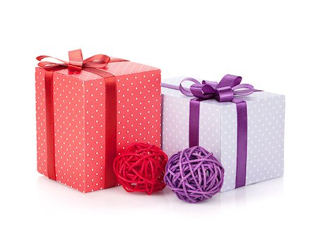 simsearch:400-08806797,k - Colorful gift boxes with ribbon and bow and christmas decor. Isolated on white background Photographie de stock - Aubaine LD & Abonnement, Code: 400-07179700