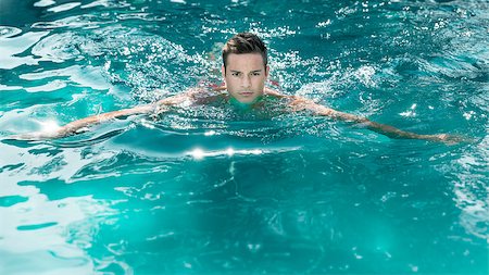 spa water background pictures - An image of a handsome young man swimming in a pool Stock Photo - Budget Royalty-Free & Subscription, Code: 400-07170665