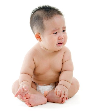 simsearch:400-07171482,k - Full body sad Asian baby boy crying, sitting isolated on white background Stock Photo - Budget Royalty-Free & Subscription, Code: 400-07171475