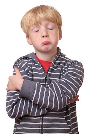 Portrait of a young offended boy on white Background Stock Photo - Budget Royalty-Free & Subscription, Code: 400-07173708