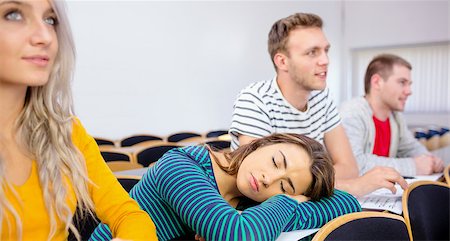 Young college students sitting in the classroom with one asleep girl Stock Photo - Budget Royalty-Free & Subscription, Code: 400-07180871