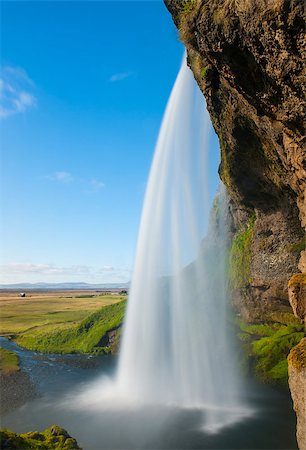 Seljalandsfoss is one of the most beautiful waterfalls on the Iceland. It is located on the South of the island. With a long exposure. Stock Photo - Budget Royalty-Free & Subscription, Code: 400-07207370