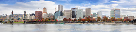 simsearch:400-07424733,k - Portland Oregon Downtown City Waterfront Skyline Along Willamette River with Blue Sky and White Clouds in Fall Season Panorama Stock Photo - Budget Royalty-Free & Subscription, Code: 400-07208523