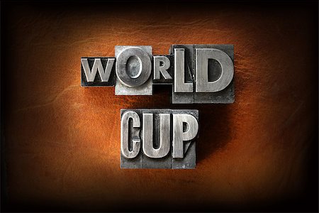 soccer retro designs - The words World Cup made from vintage lead letterpress type on a leather background. Stock Photo - Budget Royalty-Free & Subscription, Code: 400-07208593