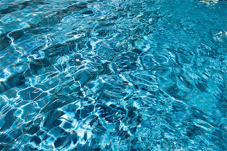 pool floor texture color - Background of deep blue swimming pool water sparkling in sunlight Stock Photo - Budget Royalty-Free & Subscription, Code: 400-07214987