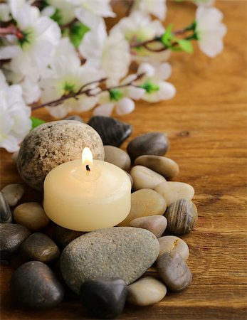 dream79 (artist) - still life a lit candle and stones on wooden background Stock Photo - Budget Royalty-Free & Subscription, Code: 400-07216837