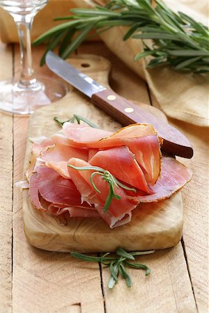 simsearch:400-06207145,k - parma ham (jamon) sliced on a wooden board Stock Photo - Budget Royalty-Free & Subscription, Code: 400-07218237