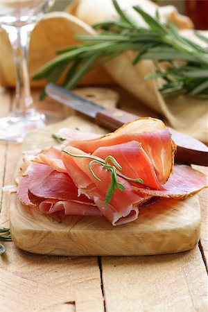 simsearch:400-06207145,k - parma ham (jamon) sliced on a wooden board Stock Photo - Budget Royalty-Free & Subscription, Code: 400-07218412