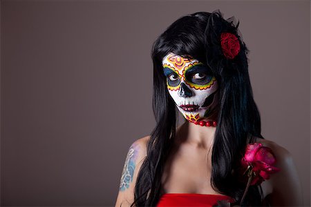 Halloween sugar skull girl with red rose, Day of the Dead theme Stock Photo - Budget Royalty-Free & Subscription, Code: 400-07210692