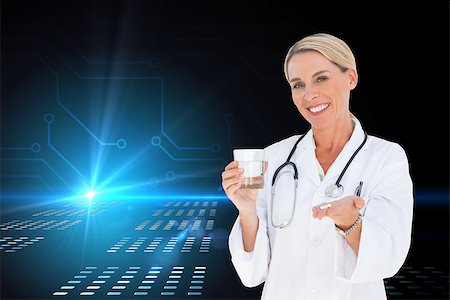 stethoscope graphic design - Composite image of happy doctor holding out pills and water glass Stock Photo - Budget Royalty-Free & Subscription, Code: 400-07226602