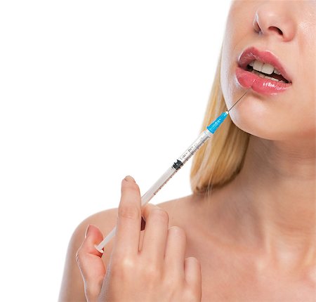 plump girls - Closeup on teenage girl making lips injection Stock Photo - Budget Royalty-Free & Subscription, Code: 400-07222554