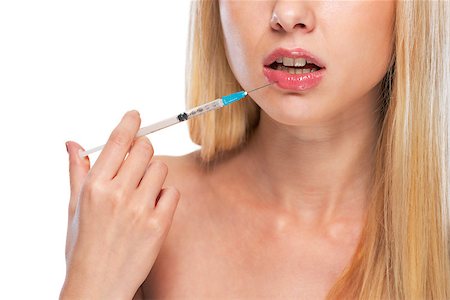 plump girls - Closeup on teenage girl making lips injection Stock Photo - Budget Royalty-Free & Subscription, Code: 400-07222553