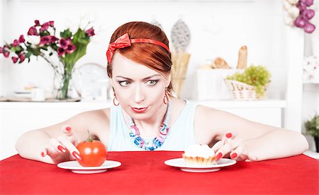 simsearch:400-05106591,k - Beautiful woman choosing between healthy food and cake Stock Photo - Budget Royalty-Free & Subscription, Code: 400-07244210