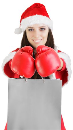 Young woman in Christmas costume on white background. Photographie de stock - Aubaine LD & Abonnement, Code: 400-07244591