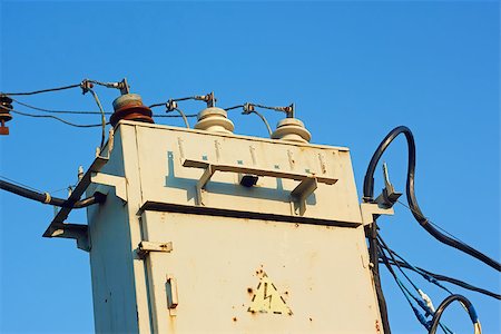 simsearch:400-03993174,k - Old transformer with insulators and wires on a background azure sky Stock Photo - Budget Royalty-Free & Subscription, Code: 400-07244630