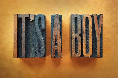 The words IT'S A BOY written in vintage letterpress type. Stock Photo - Budget Royalty-Free & Subscription, Code: 400-07245618