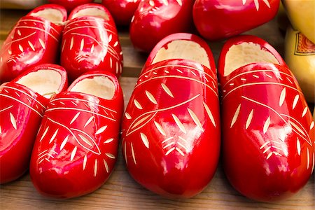 Dutch traditional wooden shoes with ornament, clogs, symbol of the Netherlands. Stock Photo - Budget Royalty-Free & Subscription, Code: 400-07246925