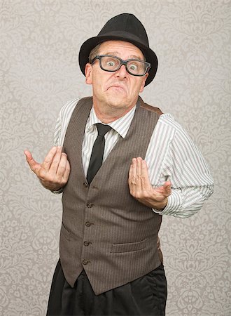 simsearch:400-06363059,k - Upset white businessman with hat and eyeglasses Stock Photo - Budget Royalty-Free & Subscription, Code: 400-07247195