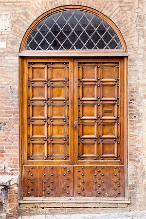 simsearch:400-07257534,k - An image of an old door in Siena Italy Stock Photo - Budget Royalty-Free & Subscription, Code: 400-07257532
