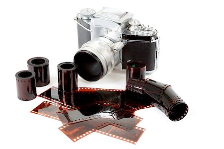 simsearch:400-05102933,k - analog vintage SLR camera and color negative films on white background Stock Photo - Budget Royalty-Free & Subscription, Code: 400-07251203