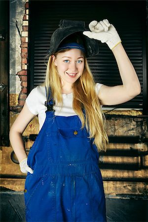 female and welding - beautiful smiling blond woman in welder helmet Stock Photo - Budget Royalty-Free & Subscription, Code: 400-07251538