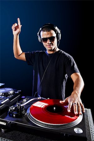 Dj playing disco electro music in a concert Stock Photo - Budget Royalty-Free & Subscription, Code: 400-07252196