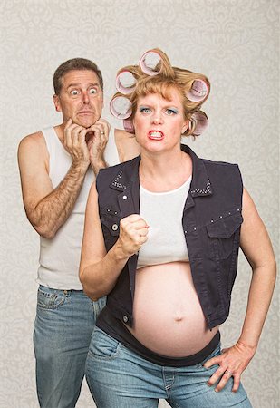 simsearch:400-06363059,k - Intimidating pregnant hillbilly woman with scared husband Stock Photo - Budget Royalty-Free & Subscription, Code: 400-07252399