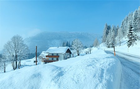 snowy austria village - Morning winter misty rural view with alpine road and house on the roadside. Stock Photo - Budget Royalty-Free & Subscription, Code: 400-07264606