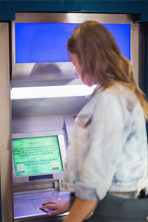 simsearch:400-05670021,k - Student entering pin at the atm in college Stock Photo - Budget Royalty-Free & Subscription, Code: 400-07268048