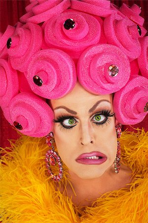 Cross eyed man in drag with plastic foam wig Stock Photo - Budget Royalty-Free & Subscription, Code: 400-07261841