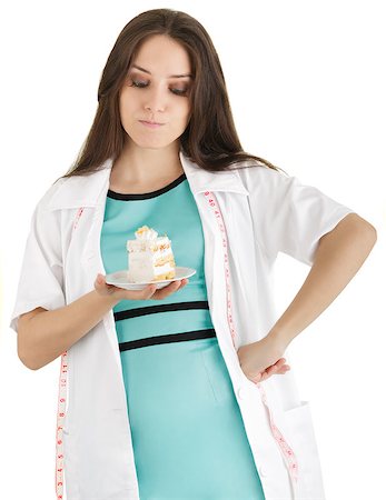 simsearch:400-05106591,k - Woman nutritionist saying “no” to cake, isolated on white background. Stock Photo - Budget Royalty-Free & Subscription, Code: 400-07261959