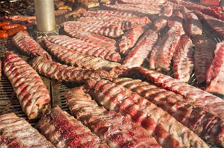 Pork ribs that have just put on the barbecue Stock Photo - Budget Royalty-Free & Subscription, Code: 400-07294267