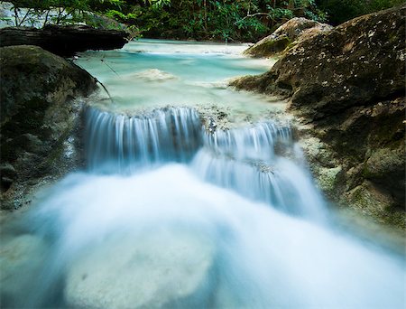 This picture shows some part of Erawan waterfall where is the most beautiful waterfall in Thailand. Stock Photo - Budget Royalty-Free & Subscription, Code: 400-07294664