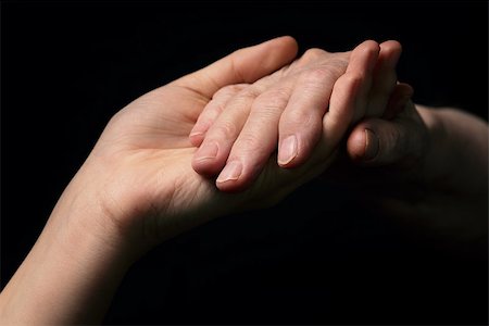 granddaughter and grandmother holding hands, support theme Stock Photo - Budget Royalty-Free & Subscription, Code: 400-07296286