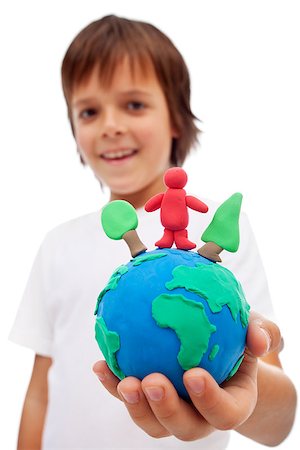 simsearch:400-06089187,k - Life in harmony with nature concept - boy holding earth globe with trees and man made of colorful clay Stock Photo - Budget Royalty-Free & Subscription, Code: 400-07297819