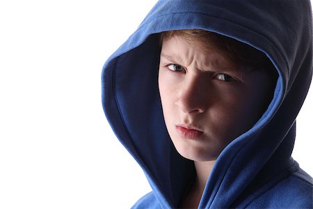 evil faces for emotions - Portrait of an angry young boy Stock Photo - Budget Royalty-Free & Subscription, Code: 400-07298032