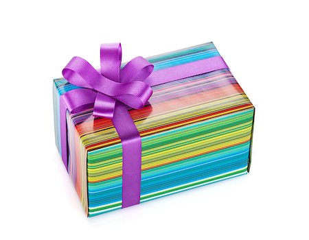 simsearch:400-08806797,k - Colorful gift box with ribbon and bow. Isolated on white background Photographie de stock - Aubaine LD & Abonnement, Code: 400-07299480