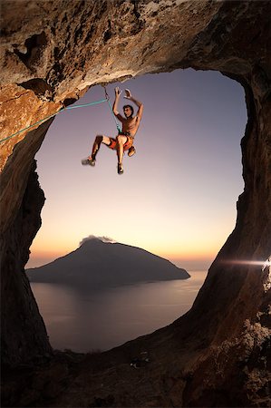 Female rock climber at sunset, Kalymnos Island, Greece Stock Photo - Budget Royalty-Free & Subscription, Code: 400-07292731