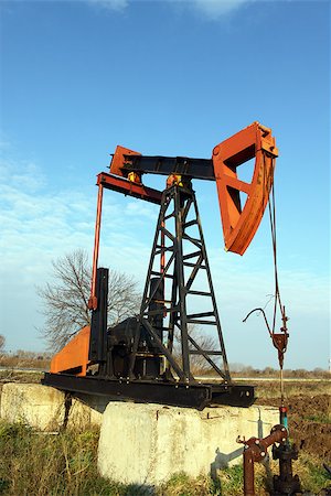 simsearch:400-04027574,k - Oil pump jack working in the field Stock Photo - Budget Royalty-Free & Subscription, Code: 400-07293282