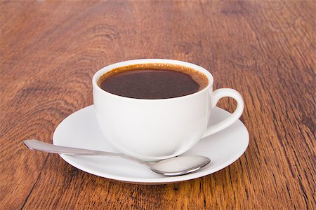 simsearch:400-07305144,k - A cup of coffee on a wooden background Stock Photo - Budget Royalty-Free & Subscription, Code: 400-07293424
