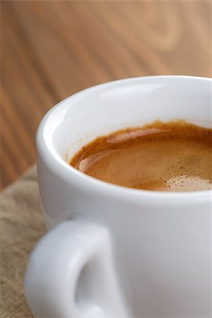 simsearch:400-07305144,k - frezshly made cup of double espresso, on wooden table Stock Photo - Budget Royalty-Free & Subscription, Code: 400-07304082