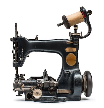 factory fashion - Vintage sewing machine white isolated Stock Photo - Budget Royalty-Free & Subscription, Code: 400-07304506