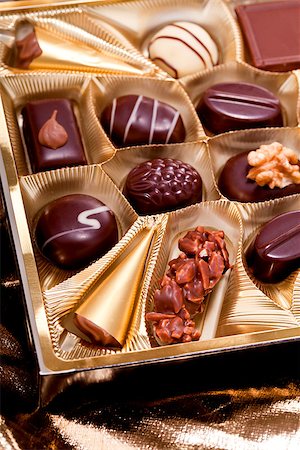 simsearch:400-04350016,k - collection of different sweet chocolate pralines closeup background present sugar Stock Photo - Budget Royalty-Free & Subscription, Code: 400-07305205